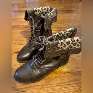 Brown leather zip up boots with leopard lining inside